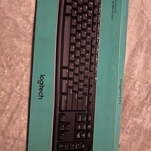Logitech Black Keyboard with Teal Packaging